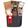 Luxe on the Go puff gift bag styled with neutral florals and rust ribbon for an elevated look.