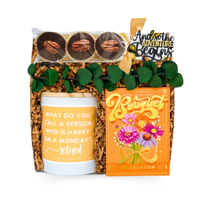 Legacy in Bloom retirement gift box in white and gold with elegant celebratory accents.