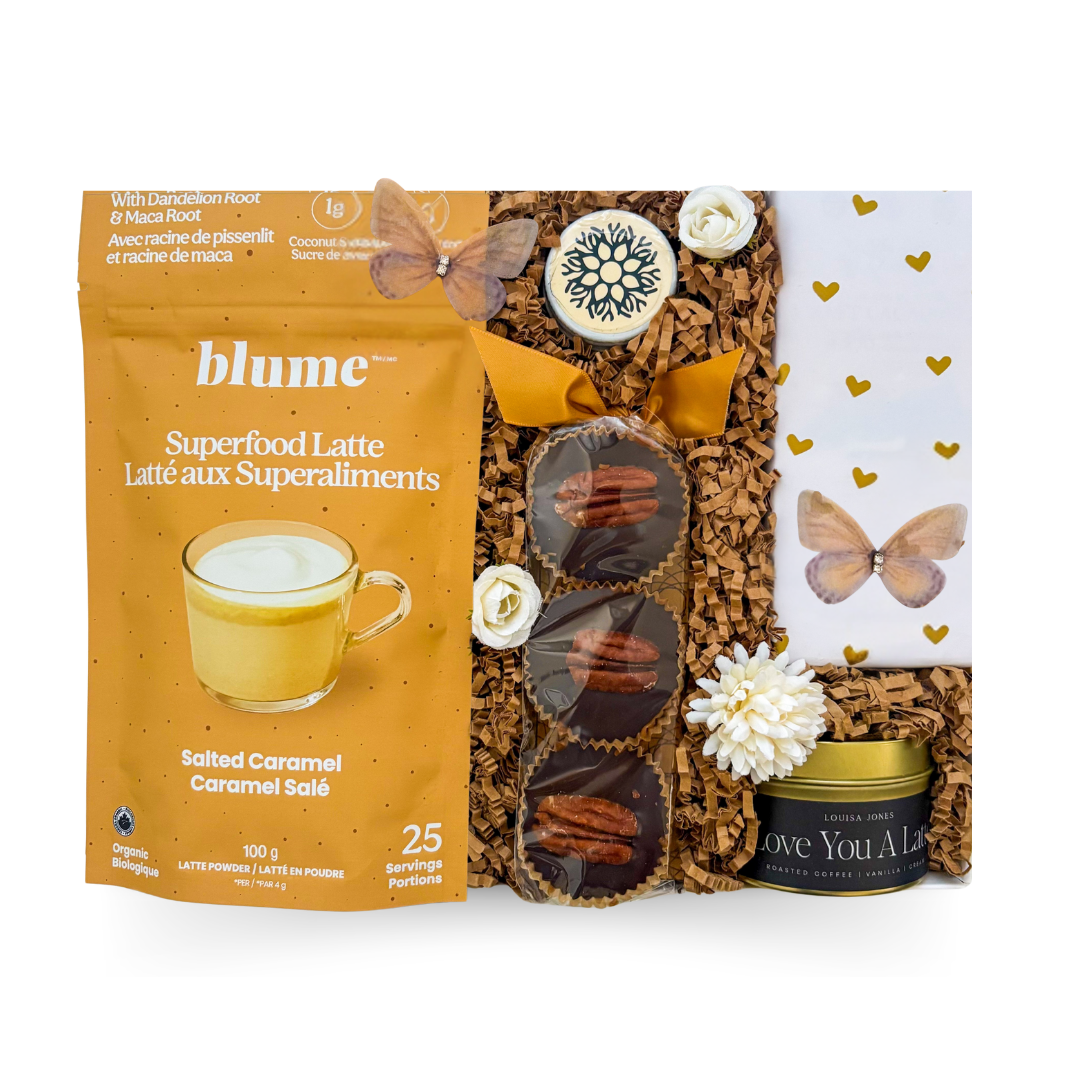 Women-founded self-care gift box with sugar-free chocolate, latte candle, salted caramel latte mix, caramel nutty cups, and lip balm in a budget-friendly signature box