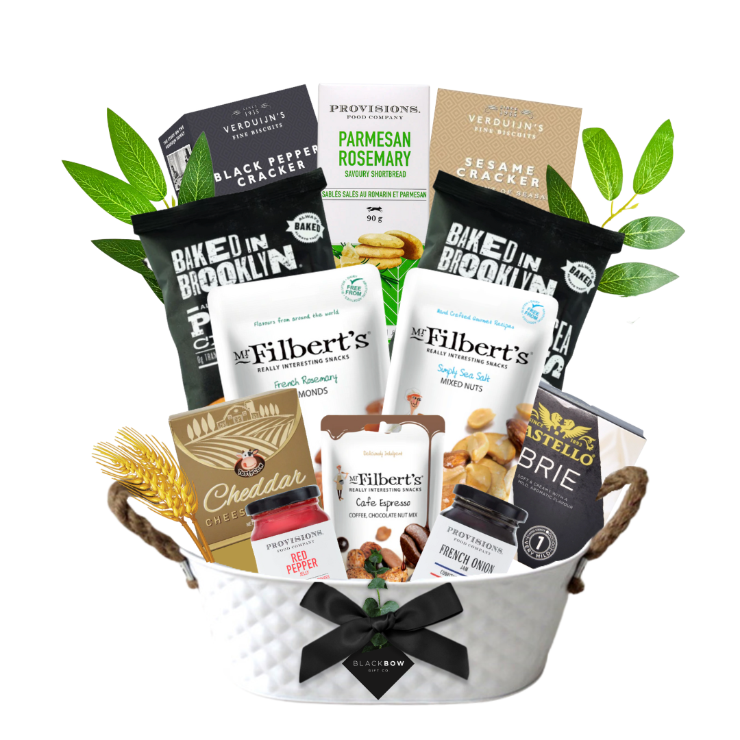 Savoury gourmet gift basket with premium snacks, crackers, spreads, and charcuterie accents for corporate and personal gifting.