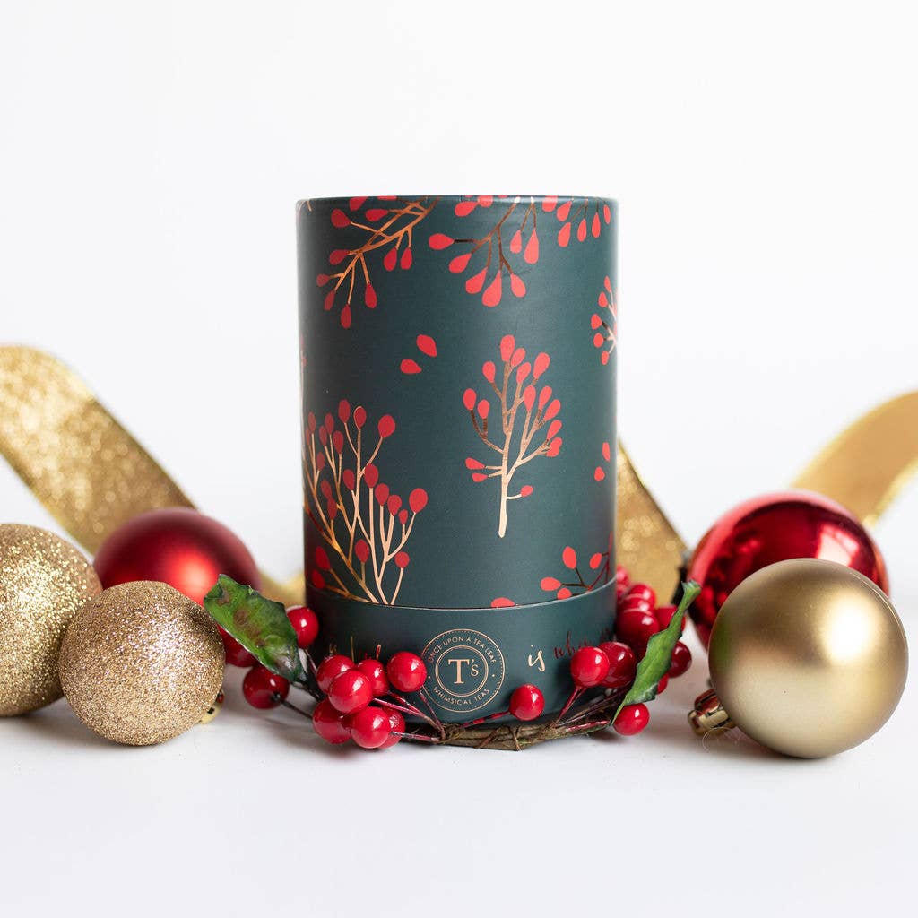 Festive Christmas tea blend in a decorative canister with Ceylon black tea, orange, cinnamon, and clove