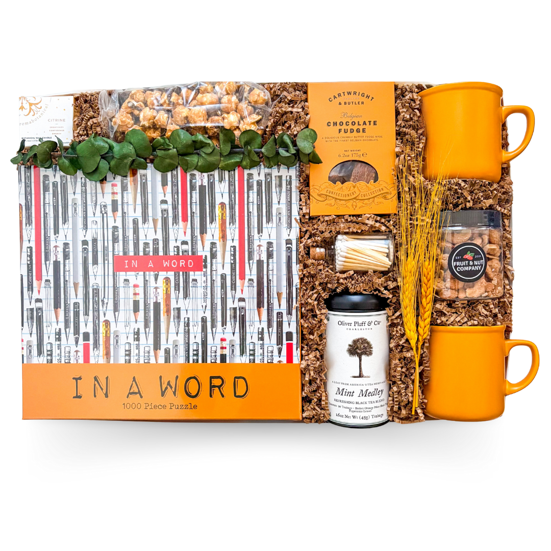 Cozy couple gift with coffee, chocolates, mugs for two, and a puzzle, styled for slow evenings and shared moments.
