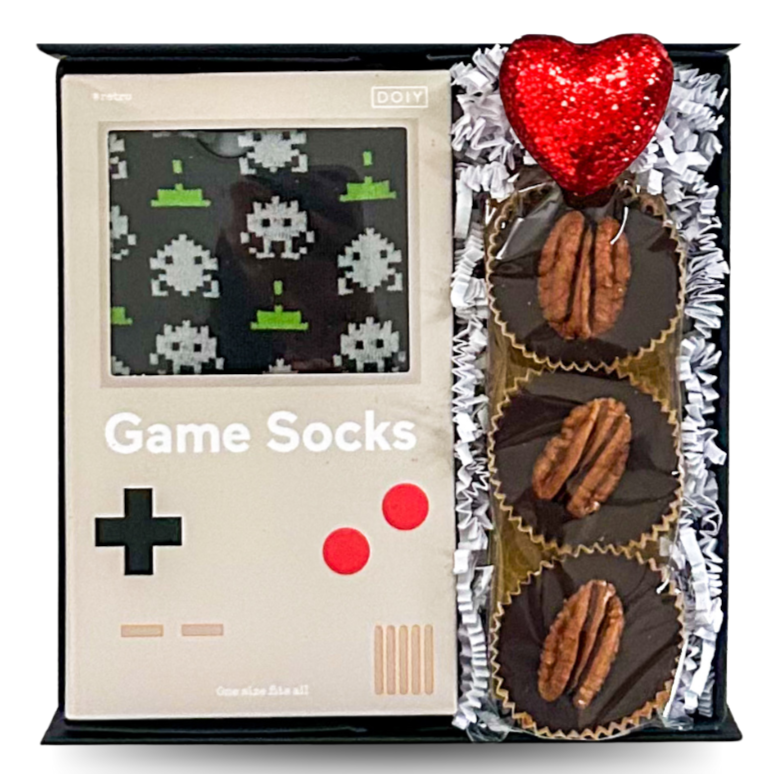 
Valentine's Day gift box, gamer Valentine's gift, men's socks gift, video game-themed gift, chocolate and socks gift box, Valentine's gift for gamers, retro gaming gift idea, unique Valentine's Day present, geeky Valentine's gift, chocolate gift box for Valentine's, fun and cozy Valentine's gift, socks and chocolate gift set, nostalgic Valentine's Day gift, gamer couple gift, Space Invaders Valentine's present, quirky Valentine's gift idea, Valentine's Day gift for him