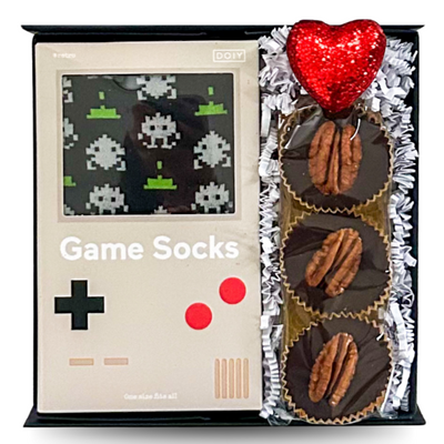 Valentine's Day gift box, gamer Valentine's gift, men's socks gift, video game-themed gift, chocolate and socks gift box, Valentine's gift for gamers, retro gaming gift idea, unique Valentine's Day present, geeky Valentine's gift, chocolate gift box for Valentine's, fun and cozy Valentine's gift, socks and chocolate gift set, nostalgic Valentine's Day gift, gamer couple gift, Space Invaders Valentine's present, quirky Valentine's gift idea, Valentine's Day gift for him