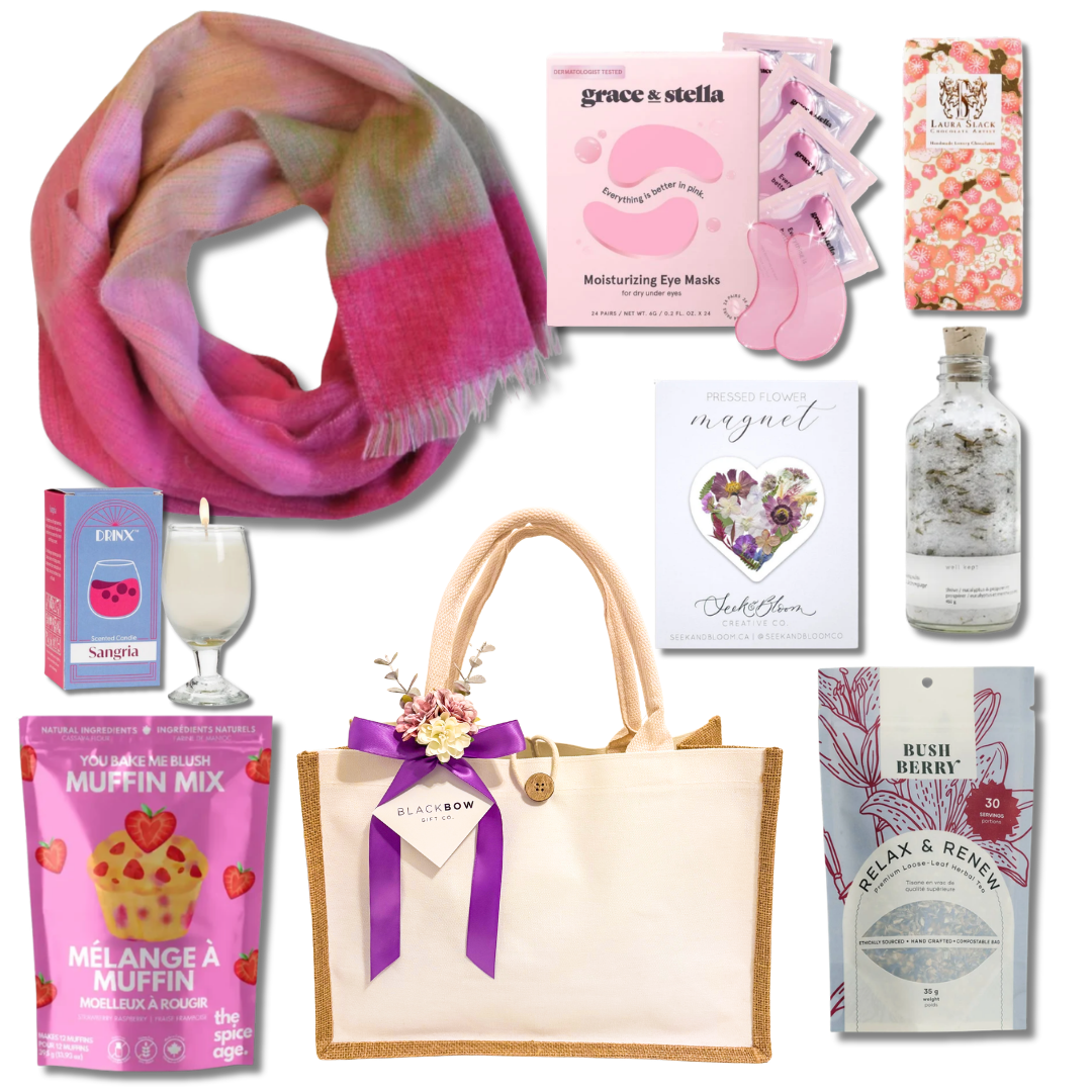 Pretty Things gift for her with a soft pink scarf, eye masks, herbal tea, bath soak, candle, baking mix and pressed flower activity, thoughtfully presented by Black Bow Gift Co.