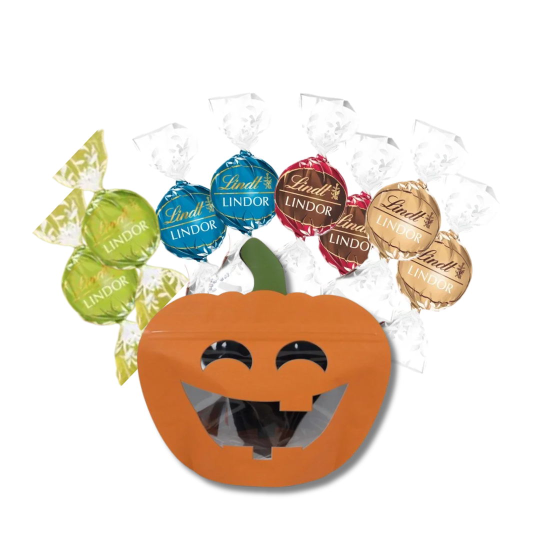 Lindt LINDOR chocolate truffles in a decorative jack-o-lantern-shaped pouch, featuring Double Chocolate, Fudge Swirl, Caramel Sea Salt, and Pistachio flavours in colourful foil wrappers, perfect for luxury gift boxes and gourmet hampers.