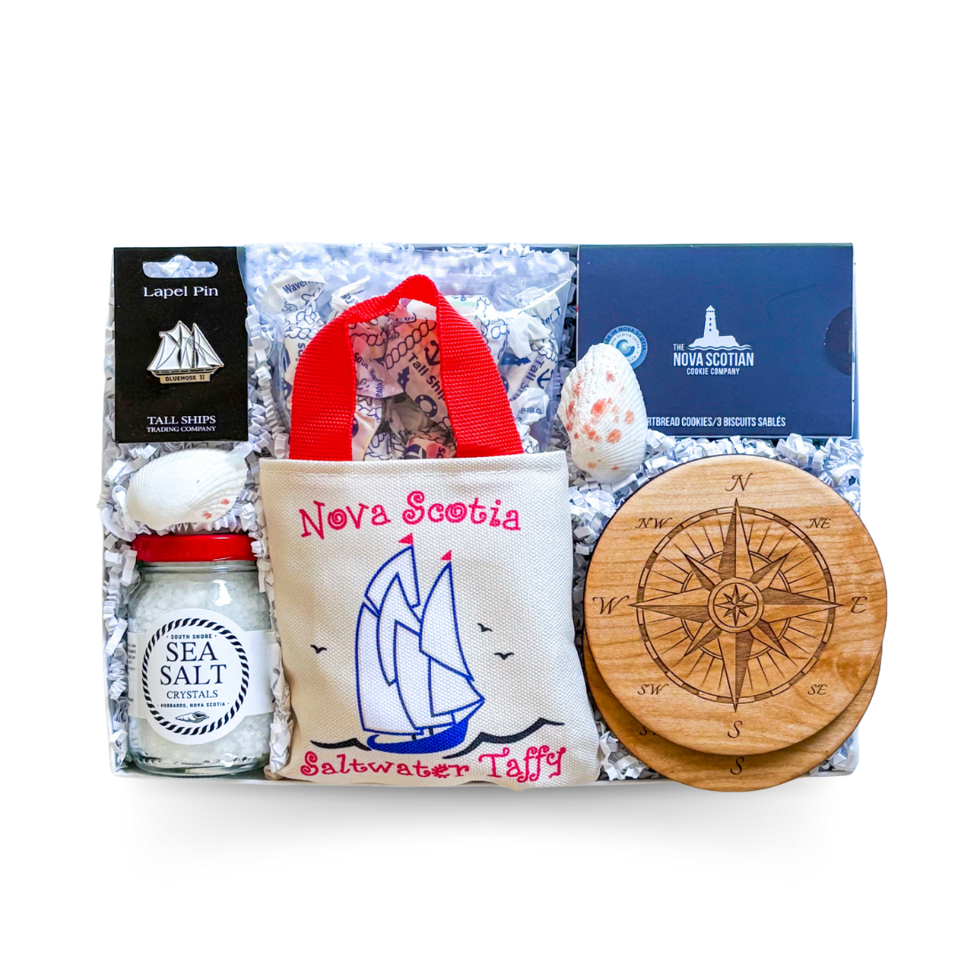 Nova Scotia Gift Boxes, Shipped Gift Boxes Canada, Maritime Themed Gifts, Coastal Gift Sets, East Coast Souvenir Boxes, Thoughtful Gifts From Nova Scotia, Gifts With Saltwater Taffy, Nautical Gift Boxes, Canadian Heritage Gifts, Unique Gifts From Atlantic Canada, Bluenose Ship Gifts, Gifts With Local Treats, Nova Scotia Shortbread Gifts, Compass Inspired Coaster Sets, Travel Gift Boxes, Rustic Canadian Gift Boxes, Gifts With Sea Salt & Snacks, Local Artisan Gift Sets, Coastal Keepsake Gifts, Pure Maritime G