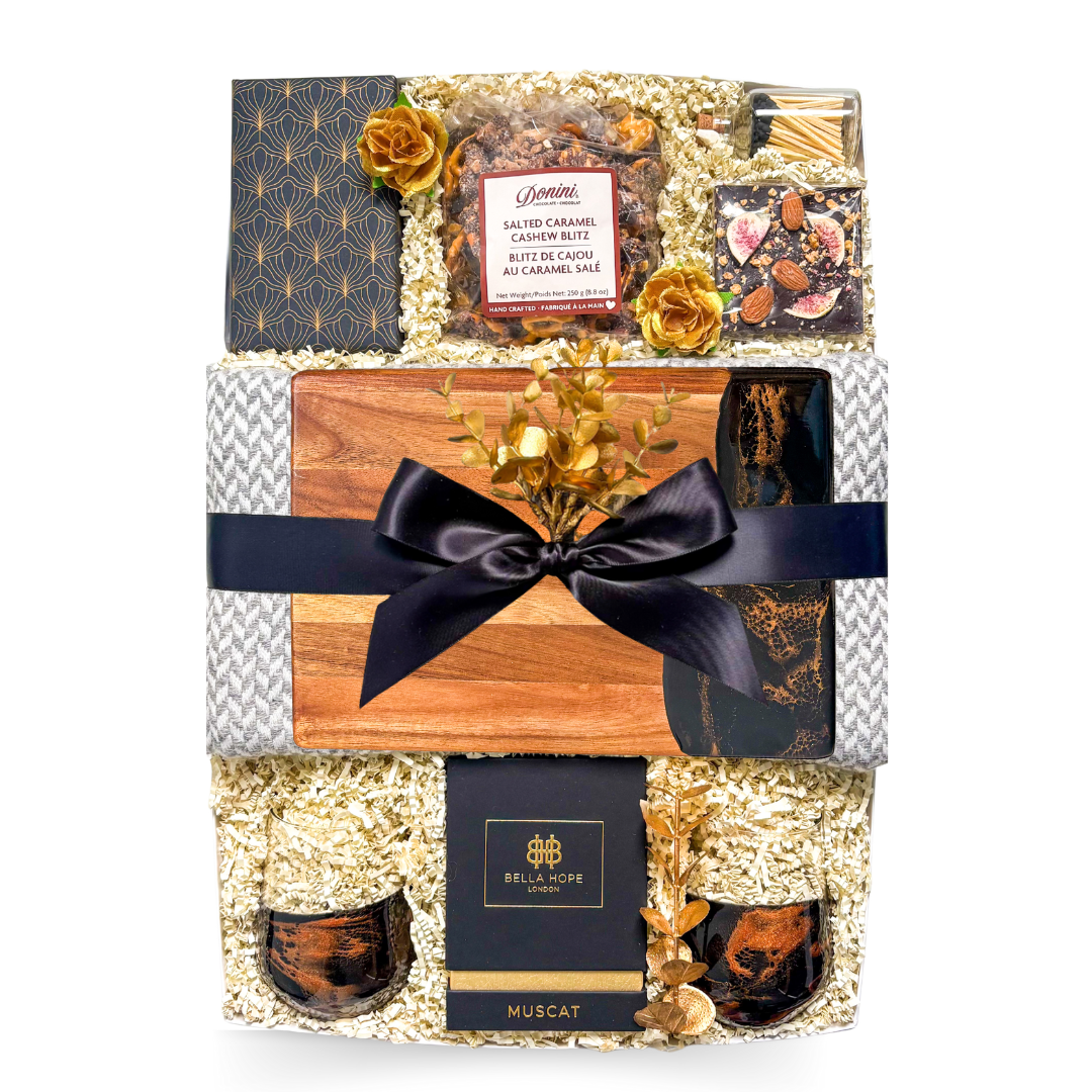 Quiet Luxury Gift Box featuring cashmere blend blanket, resin stemless wine glasses and luxury candle by Black Bow Gift Co.