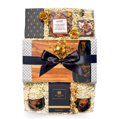 Quiet Luxury Gift Box featuring cashmere blend blanket, resin stemless wine glasses and luxury candle by Black Bow Gift Co.