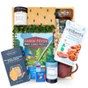 Luxury comfort gift box with blanket, tea, and cozy accents