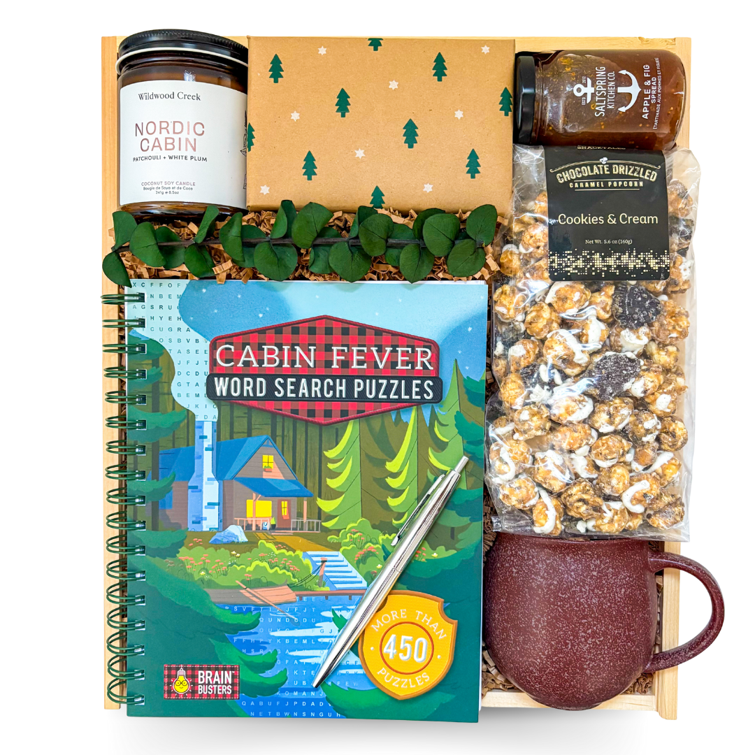 Luxury comfort gift box with blanket, tea, and cozy accents