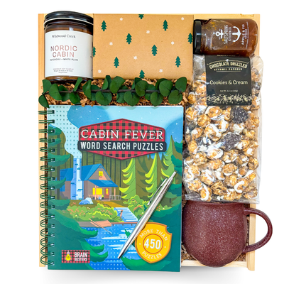 Luxury comfort gift box with blanket, tea, and cozy accents