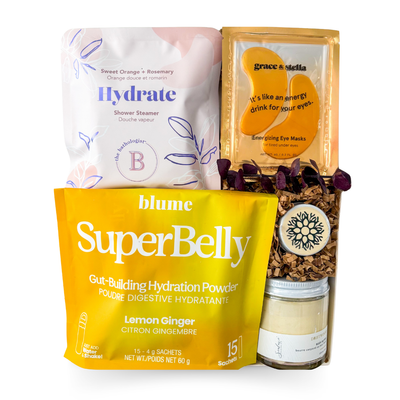 Self care gift box featuring wellness essentials, hydration support, shower steamer, eye masks, body care products and nourishing granola by Black Bow Gift Co.