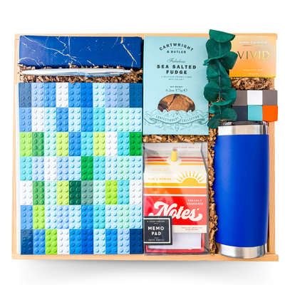 Built for Brilliance executive wood box gift with creative desk tools, premium chocolates and vibrant accents by Black Bow Gift Co.
