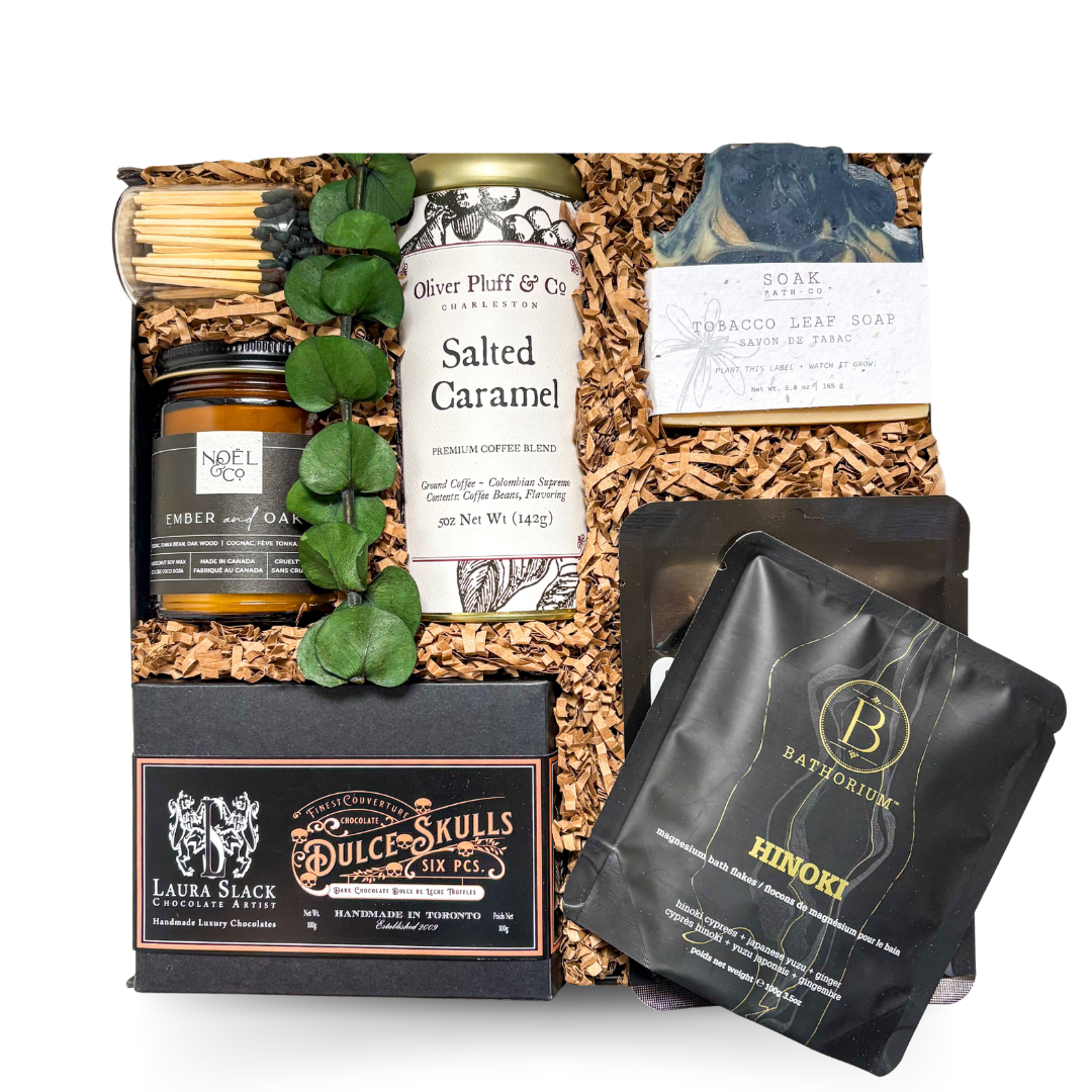 Luxury spa-inspired gift box for him featuring artisan soap, candle, bath soak, gourmet coffee, luxury chocolates, and elevated black presentation by Black Bow Gift Co.

