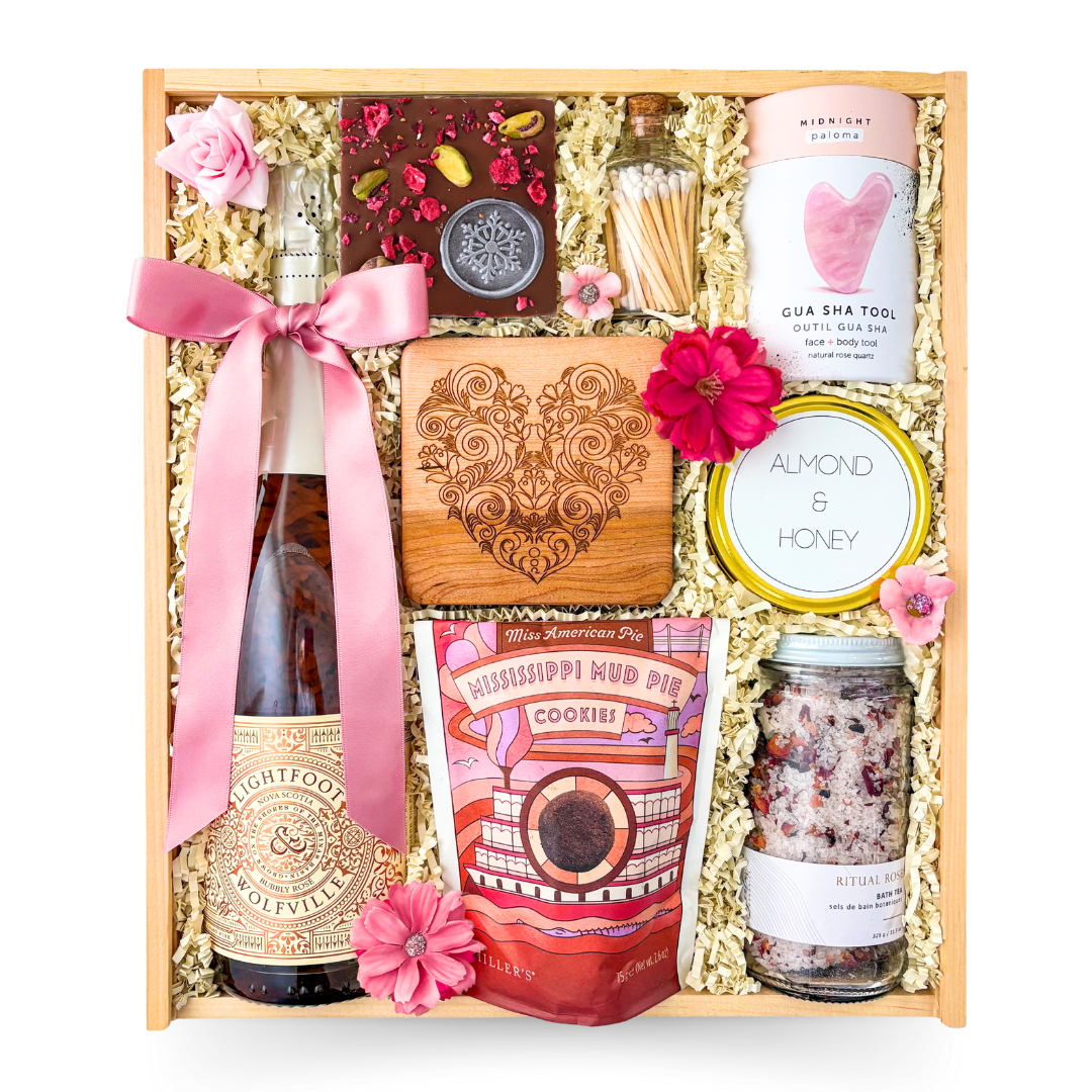 Rosé & Relaxation luxury rosé and spa gift box with candle, chocolates, bath salts and heart accents in a keepsake wood box by Black Bow Gift Co.
