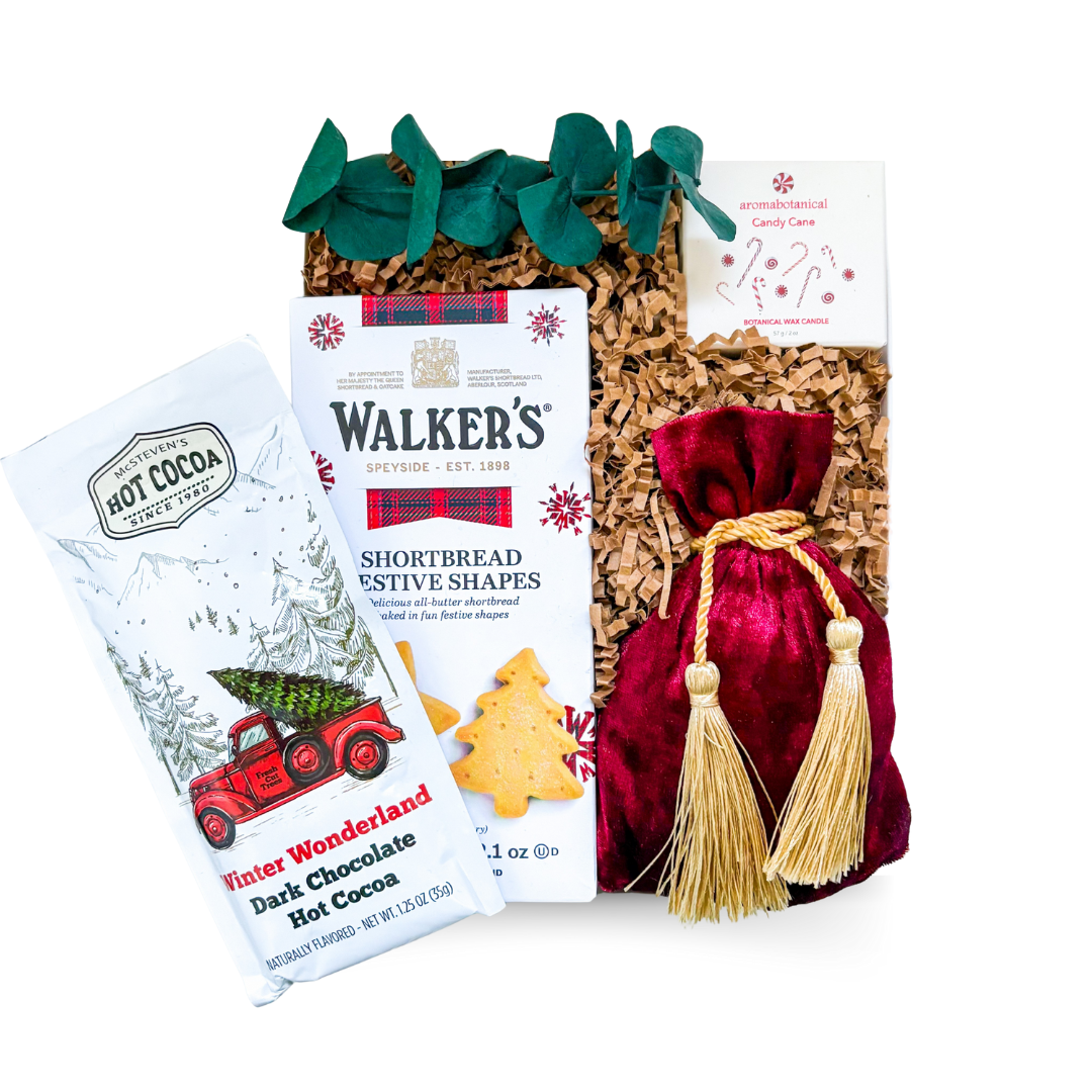 Santa’s Treats small holiday gift box with cookies, chocolates, and a candy cane candle