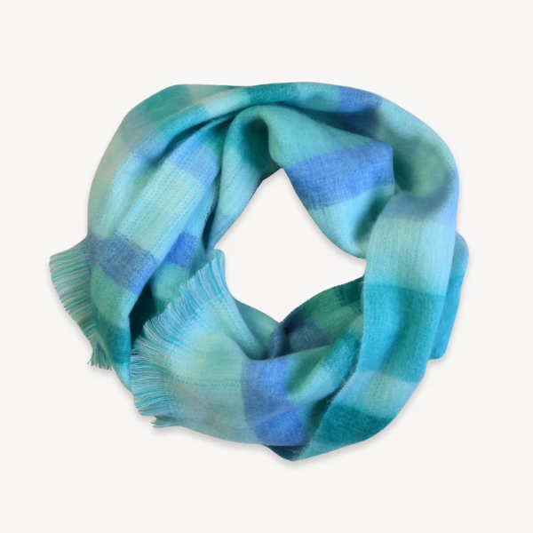 Soft bright blue alpaca blend scarf with a lightweight, cozy design for warmth, layering, and everyday style.