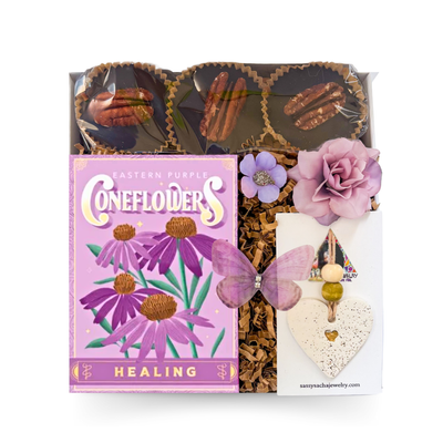 Seeds of Strength encouragement gift box with healing seed pack, artisan chocolates and purple floral accents by Black Bow Gift Co.