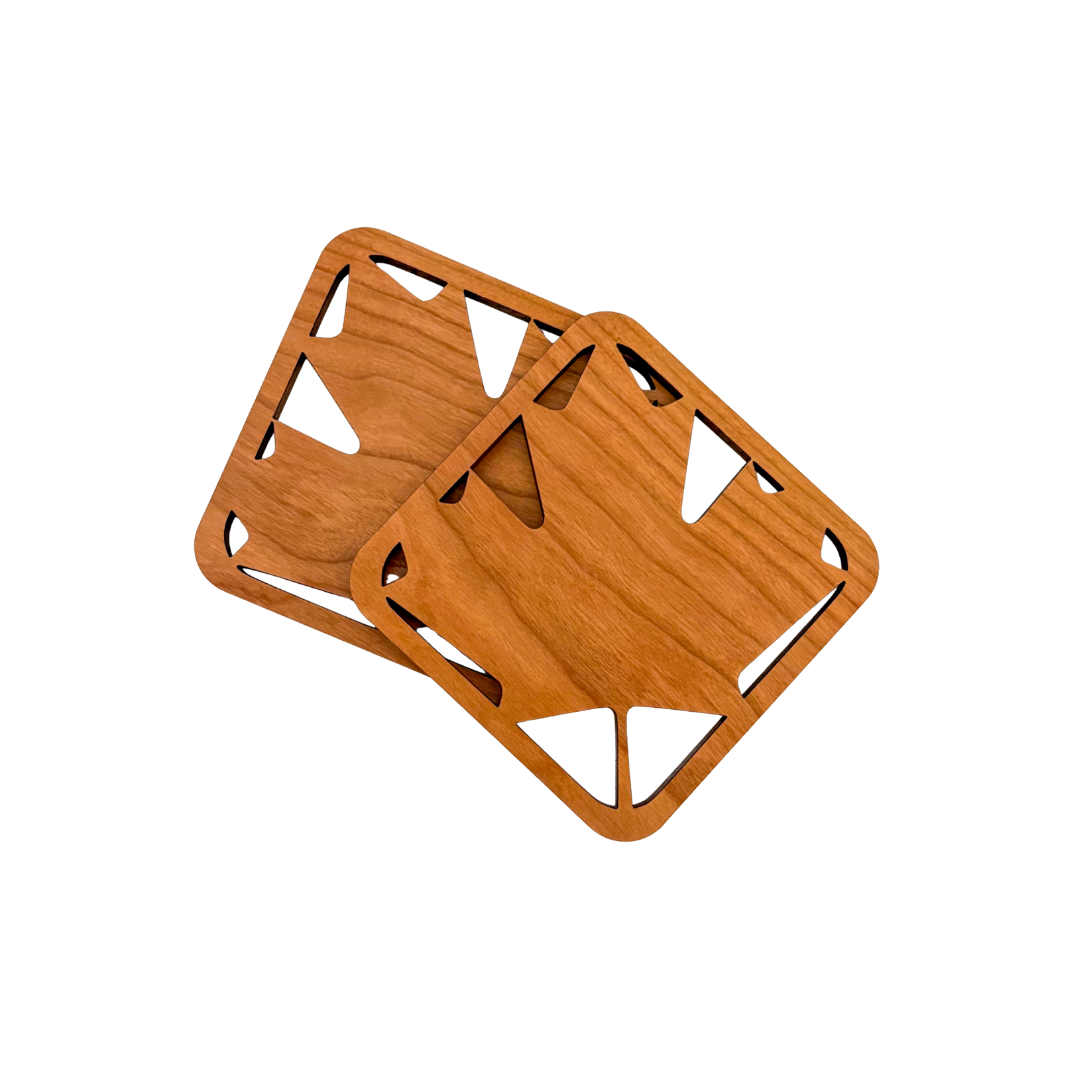 Includes:
- Your Choice of Two Classic Matte Navy Mugs OR Two Classic Matte Black Mugs
- Chamomile Tea
- Dark Chocolate Peppermint Patties
- Set of Two Birch Coasters with Nature Design (Previously with pictured&nbsp; Compass Design)
- Double Chocolate Mocha Shortbread Wrapped in Premium Wrapping Paper (Previously shown with Classic Caramel Artisanal Popcorn)&nbsp;
- Blue Fish Print Dishtowel