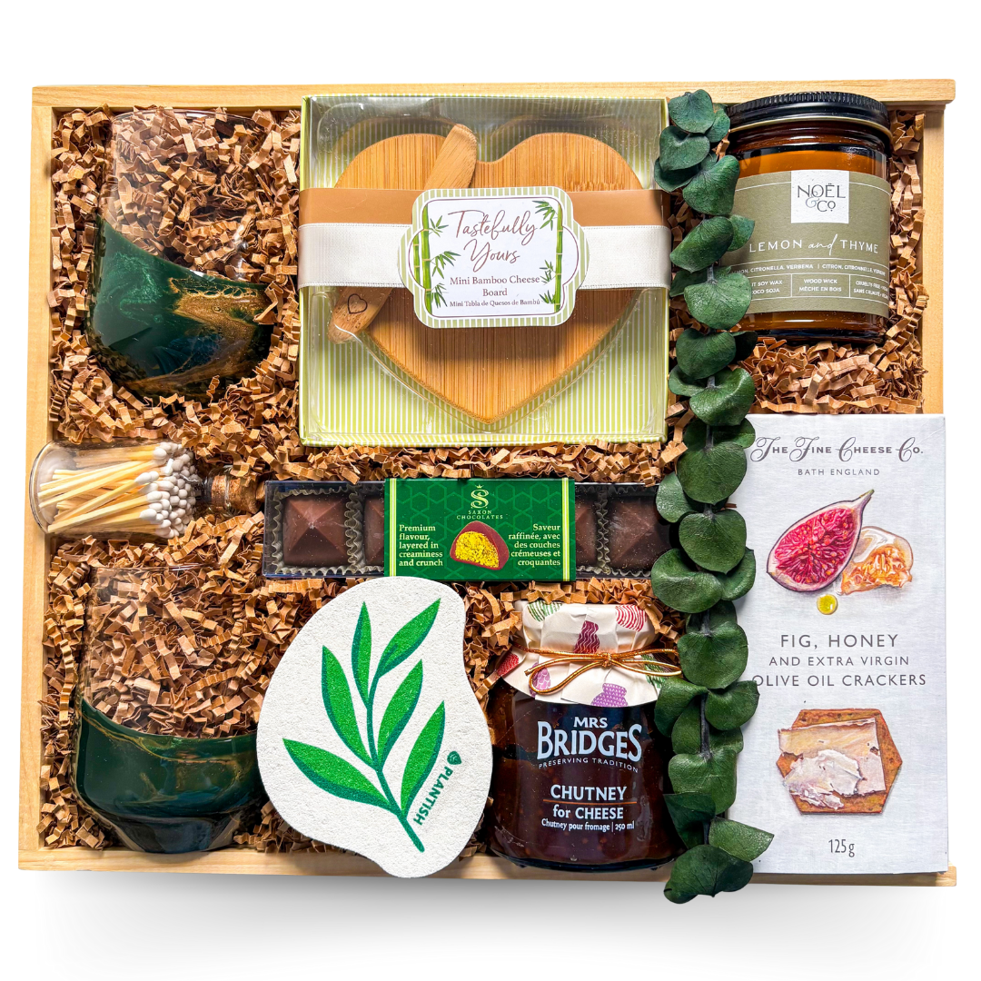 Indulgent wine and cheese gift with heart-shaped board and wine glasses styled for shared moments.