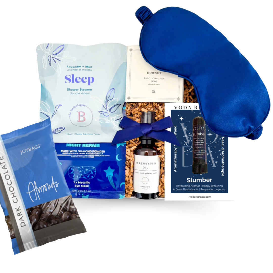 Luxury sleep gift box with lavender shower steamer, magnesium spray, satin sleep mask, aromatherapy inhaler, functional tea, night eye repair and dark chocolate almonds — a relaxing wellness gift for better sleep, self-care, corporate gifting and get well wishes.