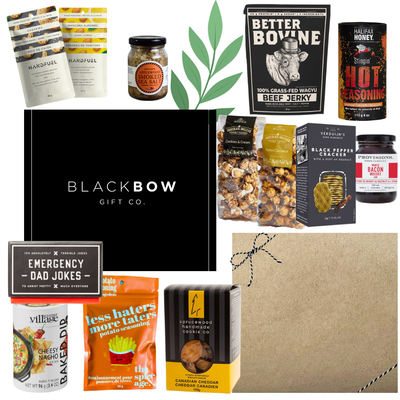 Snack Stash gourmet gift box with jerky, cashew, almonds, caramel snacks, smoky seasonings, chocolates, dip mix, and dad-themed treats in a sleek black gift box. Great for Dad