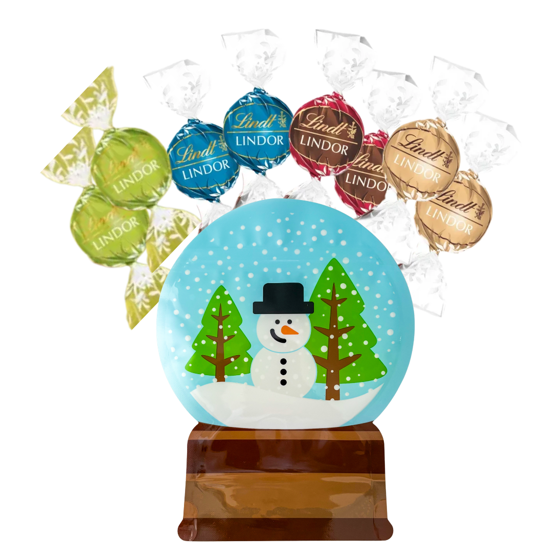 Lindt LINDOR chocolate truffles in a decorative Snow Globe-shaped pouch, featuring Double Chocolate, Fudge Swirl, Caramel Sea Salt, and Pistachio flavours in colourful foil wrappers, perfect for luxury gift boxes and gourmet hampers.