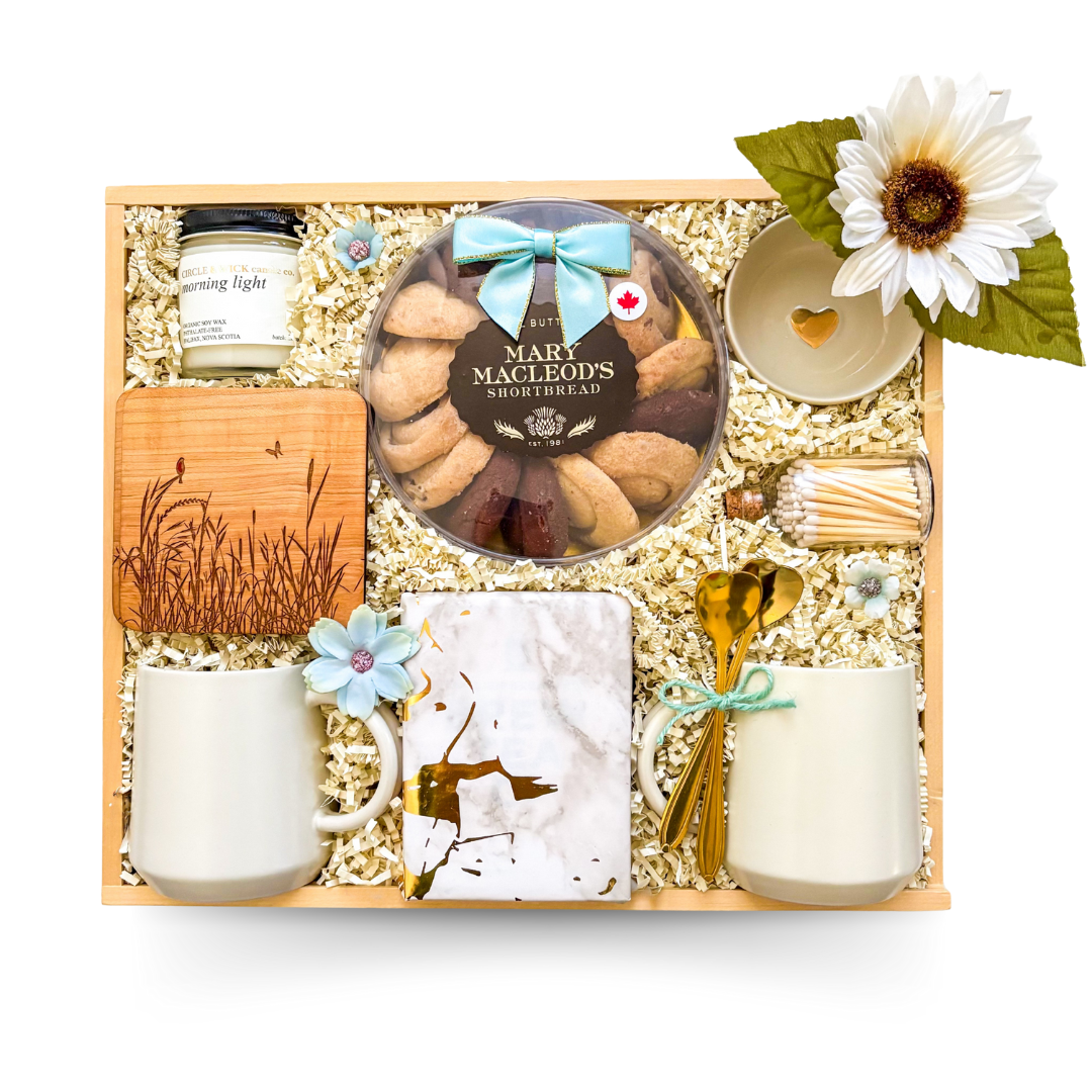 Cozy gift with tea and a snack styled for warm, comforting moments.
