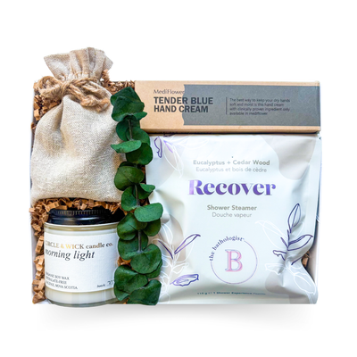 Soft Landing small self care gift box with wellness accents, artisan chocolates and soft blue details by Black Bow Gift Co.