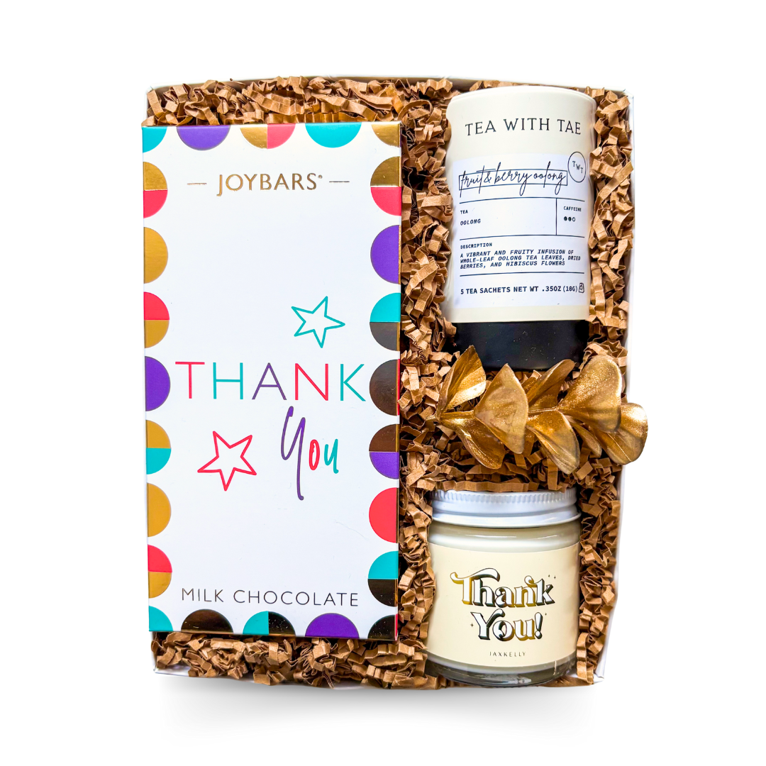 Special Thanks Gift Box with thank-you candle, tea, and vibrant milk chocolate bar styled for a calm and elegant expression of gratitude.