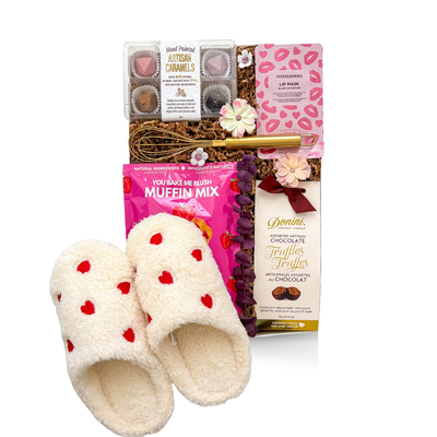 Sweet treat gift box with chocolates, baking mix, gold whisk, and self-care details, styled in a romantic yet modern gifting aesthetic.