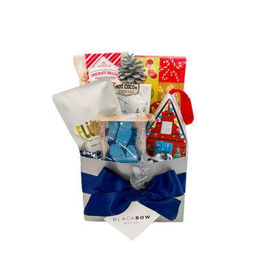 Festive holiday gift basket with sweet treats and cheerful surprises by Black Bow Gift Co.