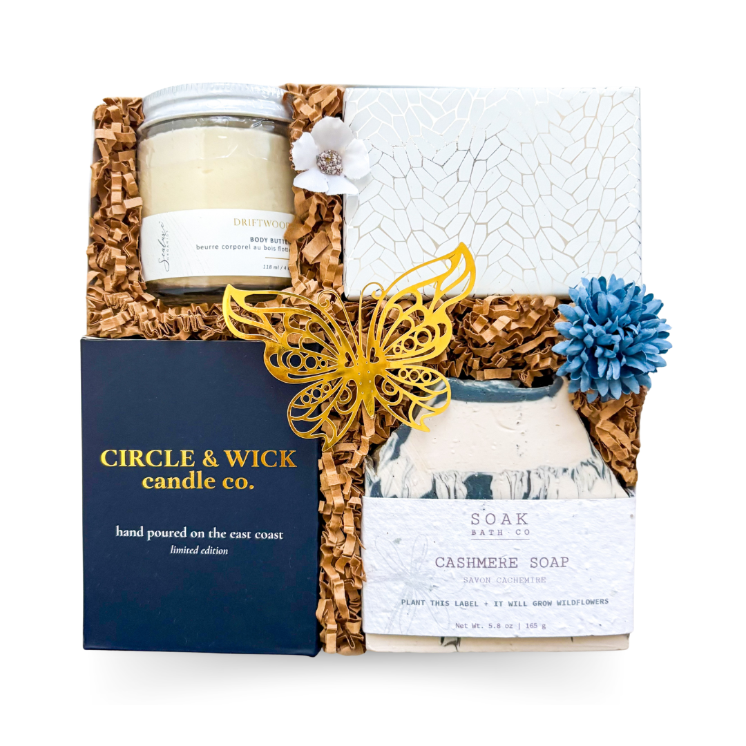 Luxury women-founded self-care gift box with cashmere candle, plantable soap, body butter, and gourmet treats curated by a women-led gifting company