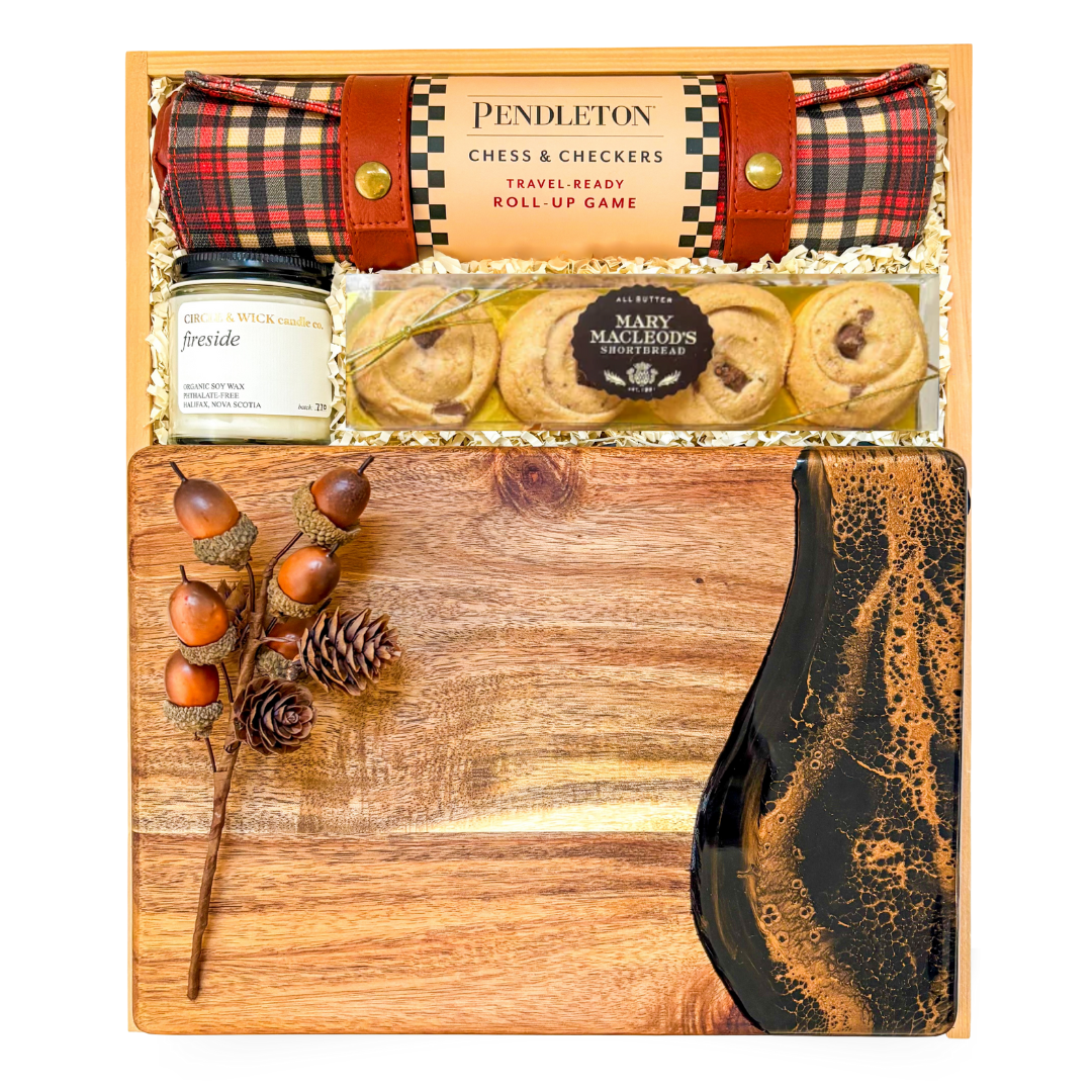 Luxury entertainer’s gift box with chess, charcuterie, and coffee table book