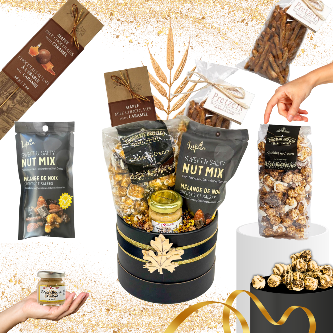 Luxury black and gold snack gift box with gourmet popcorn, nuts, and chocolates by Black Bow Gift Co.