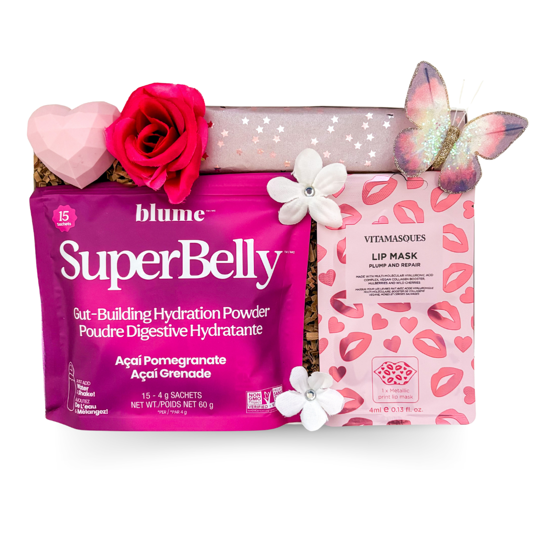 Pink window gift box with beauty and wellness essentials, Dubai chocolates, lip care, and celebratory accents designed for birthday and bridesmaid gifting