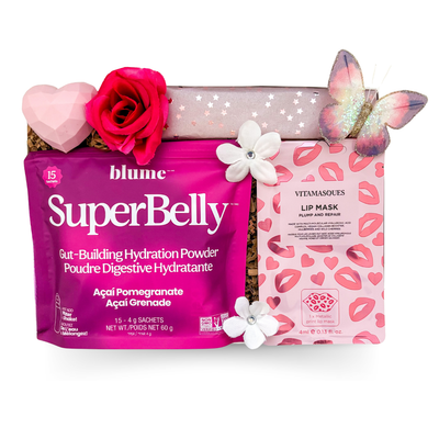 Pink window gift box with beauty and wellness essentials, Dubai chocolates, lip care, and celebratory accents designed for birthday and bridesmaid gifting