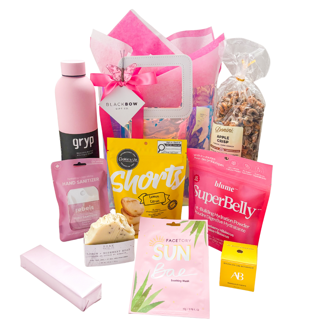 The Happy Tote gift with treats, chocolates and self-care items in a holographic tote bag by Black Bow Gift Co.
