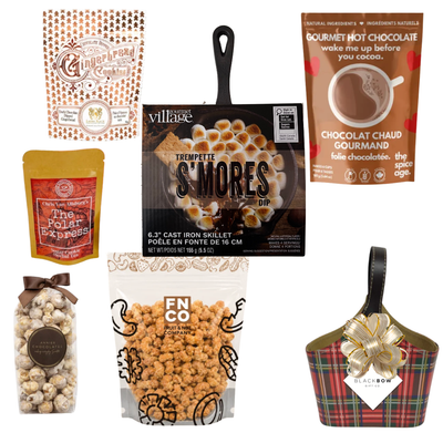 The Merry Mix Christmas gift basket in a red tartan leatherette keepsake basket featuring gourmet holiday treats, hot chocolate, popcorn and festive greenery.