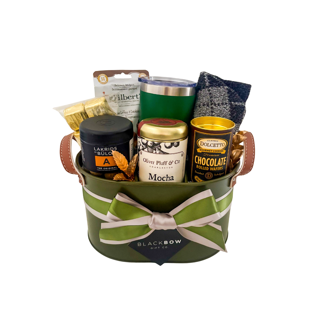The Perfect Blend luxury coffee gift basket in green metal caddy with insulated tumbler, cozy socks, gourmet coffee, chocolates and treats.