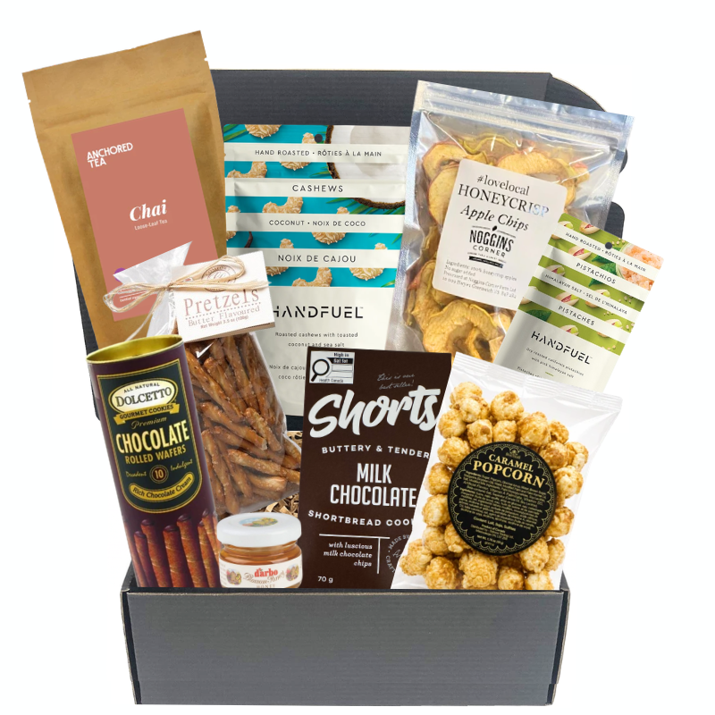 The Perfect Pause tea gift box with chai, caramel popcorn, chocolate, apple chips, pretzels, dried fruit and gourmet nuts

