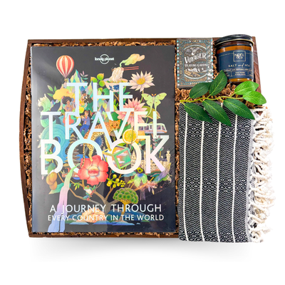 The Travel Collection luxury travel gift with premium world travel book, Theory11 Voyager playing cards, Turkish throw and sea salt candle on wooden serving tray by Black Bow Gift Co.
