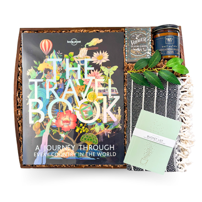 The Travel Collection luxury travel gift with premium world travel book, Theory11 Voyager playing cards, Turkish throw and sea salt candle on wooden serving tray by Black Bow Gift Co.