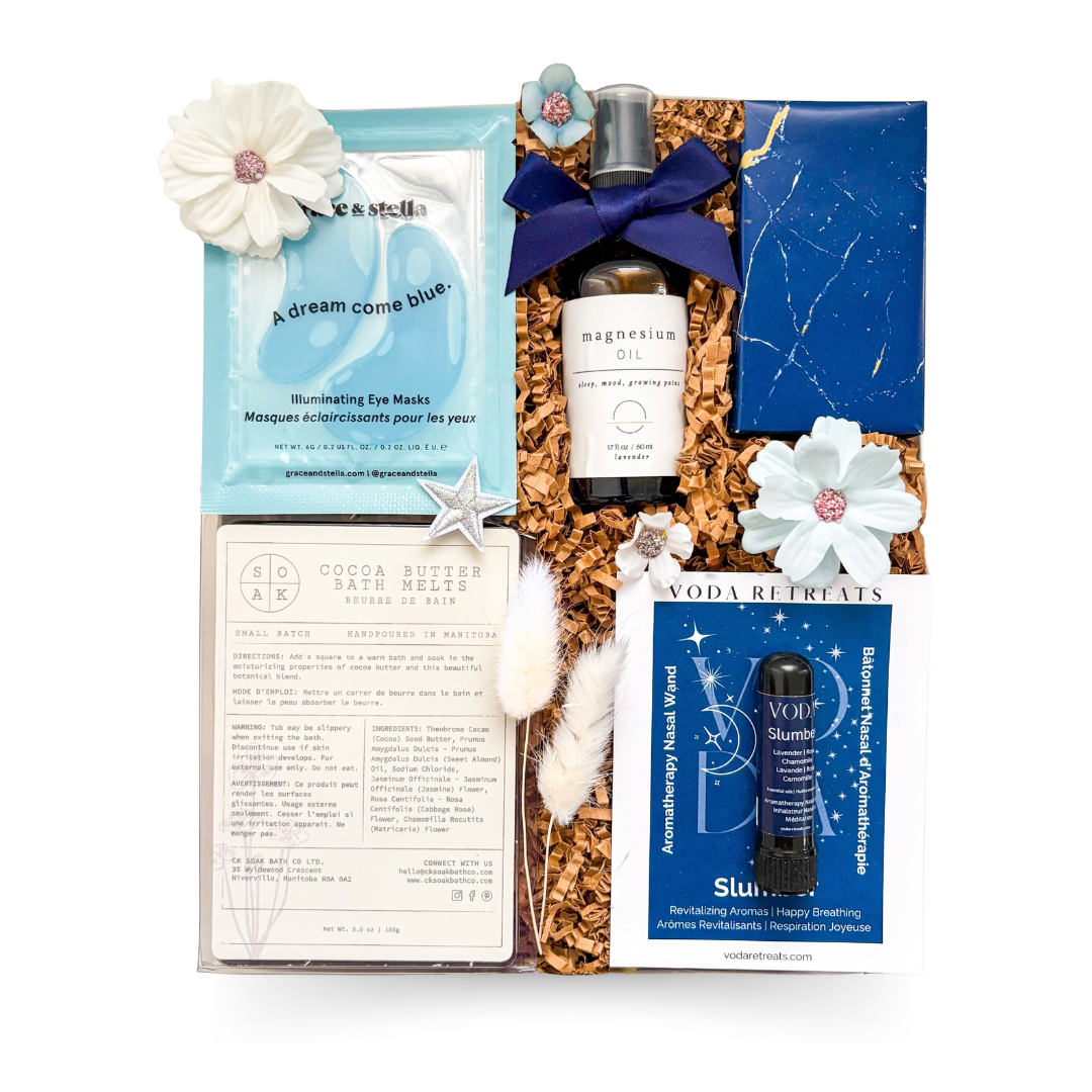 Luxury sleep and wellness gift box with magnesium spray, nasal inhaler, bath melts, under eye patches, shortbread cookies, and women-founded collaboration packaging
