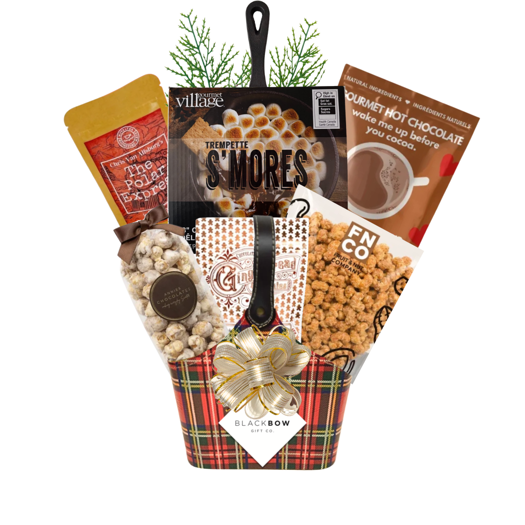 The Merry Mix Christmas gift basket in a red tartan leatherette keepsake basket featuring gourmet holiday treats, hot chocolate, popcorn and festive greenery.