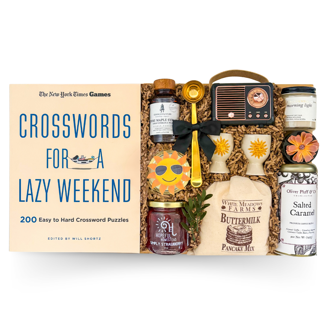 Cozy Weekend Retreat gift box featuring breakfast-inspired treats, coffee, crossword book, maple syrup, candle, pancake mix, and relaxing lifestyle items curated by Black Bow Gift Co.
