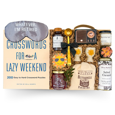 Cozy Weekend Retreat gift box featuring breakfast-inspired treats, coffee, crossword book, maple syrup, candle, pancake mix, and relaxing lifestyle items curated by Black Bow Gift Co.