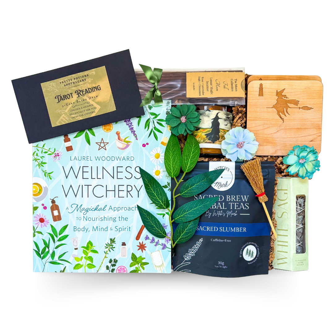 The Wellness Witch Box gift with tarot experience cards, witchy accents, candle, and herbal tea for mystical self-care