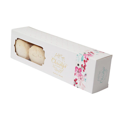Christy's whipped butter shortbread cookies in a decorative floral gift box, featuring delicate, buttery biscuits, perfect for holiday gift boxes and gourmet treats.